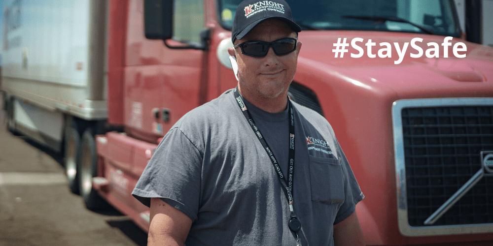 Drive standing in front of a Knight Transportation truck, #staysafe showing, Top 10 COVID-19 Safety Tips post cover image