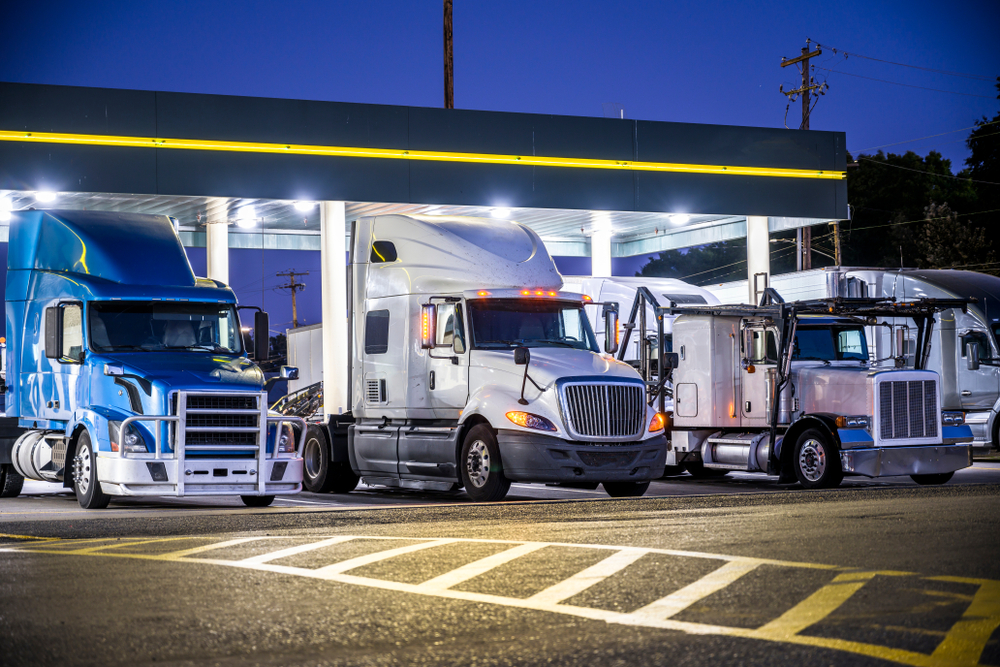 Trucks at a truck stop. Truck stop etiquette for truck drivers